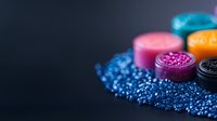 Colorful medicine pills and scattered blue granules on dark background, pharmaceutical concept for healthcare and medical treatment. Macro photography.
