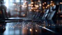 Blurred laptop keyboard with magical glowing particles and bokeh lights creating atmospheric night mood, modern technology concept with copy space.
