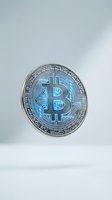 Single bitcoin coin floating against clean white background showcasing cryptocurrency digital currency symbol for financial technology concepts.