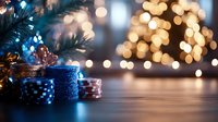 Festive holiday scene with wrapped gifts under decorated tree with warm bokeh lights creating magical Christmas atmosphere on wooden surface.