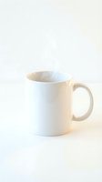 Clean white ceramic coffee mug on neutral background for kitchen and dining mockups, product photography and branding projects.
