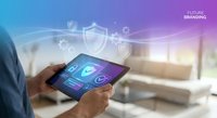 Businessman using digital tablet with cybersecurity shield icons and data protection interface in modern office environment for secure business operations.