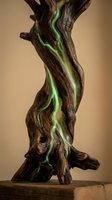 Twisted driftwood sculpture with flowing green resin inlay creating organic art piece for modern interior design and home decor applications.