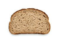 Slice of whole wheat bread with visible grain texture and air pockets, isolated on white background for food and bakery design projects.
