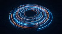 Glowing neon circular light trails in blue and orange colors creating dynamic spiral motion effect on dark background for technology designs.