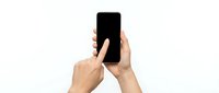 Hands holding smartphone with blank black screen on white background, isolated for app mockup and digital design use.