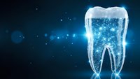 Glowing digital tooth with sparkling particles on dark blue background for dental care and oral health concepts in modern medical technology design.