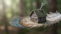 Miniature wooden house with smoking chimney resting on large feather against blurred natural background for fantasy and surreal concept designs.