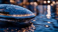 Shimmering water droplet macro photography with bokeh lights reflecting on dark blue surface, creating magical evening atmosphere for nature backgrounds.
