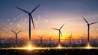 Wind turbines generating renewable energy at sunset with digital network connections representing smart grid technology and sustainable power solutions.