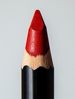 Sharpened red pencil with black barrel and natural wood tip isolated on white background, suitable for education, art, writing, and design projects.