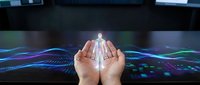 Cupped hands protecting glowing human figure hologram above digital technology interface with flowing data streams and futuristic network connections.