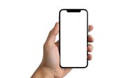 Hand holding modern smartphone with blank white screen isolated on white background for app presentation and mobile technology mockup design.