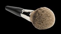 Makeup brush with natural bristles and black handle isolated on transparent background, ready for beauty product design, cosmetics packaging, t-shirt graphics, and print-on-demand applications.