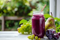 Fresh purple smoothie in mason jar with green grapes, pear and plums on white wooden table. Healthy detox drink with fresh seasonal fruits and berries.