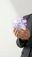 Businesswoman holding glowing digital communication icons with chat bubbles and stars, representing online messaging, social media engagement, and customer interaction for business technology concepts.