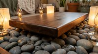 Rustic wooden cutting board on smooth river stones surrounded by glowing candle lanterns, creating a warm, cozy atmosphere.
