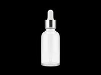 Clear glass dropper bottle with silver metallic cap and rubber pipette, isolated on transparent background. Ready for cosmetics, skincare, essential oils, serums, and wellness product design use.