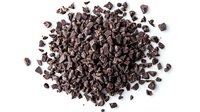 Dark chocolate chips scattered in pile on white background, ideal for baking ingredients and dessert recipes.