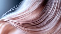 Flowing silky strands in rose gold and silver tones create elegant waves against dark background, abstract luxury hair or fabric texture for beauty and fashion designs.