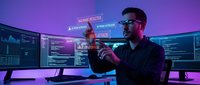 Cybersecurity analyst working with holographic interface displays in futuristic command center with purple neon lighting for digital security operations.