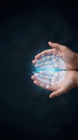 Human hands protecting glowing digital brain with circuit patterns and light effects on dark background for AI and technology concepts.