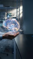 Scientist holding glowing holographic brain with neural pathways in modern laboratory setting, representing artificial intelligence, neuroscience research, and innovation.