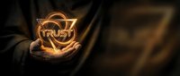 Businessman hands holding glowing trust shield symbol with golden light effects representing security, reliability and business confidence in dark background.