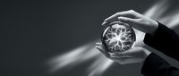 Hands holding glowing brain sphere with neural connections, representing innovation, intelligence, and future technology concepts for business and science applications.