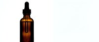 Amber glass dropper bottle with pipette on white background, suitable for essential oils, serums, tinctures, and cosmetic product packaging.