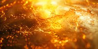 Abstract golden liquid texture with sparkling bokeh effect and light reflections, perfect for luxury backgrounds and creative design projects in advertising and branding.