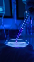 Pipette dispensing purple liquid into petri dish in laboratory setting with glowing blue neon lighting, suitable for scientific research and biotech applications.