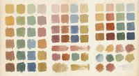 Watercolor paint swatches palette showing various earth tones, blues, greens and warm colors on textured paper for artistic projects and design work.