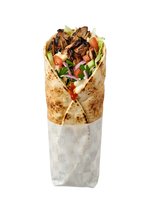 Grilled meat wrap with fresh vegetables and lettuce in whole wheat tortilla, isolated on white background, ready for food service, restaurant menu, and culinary design use.