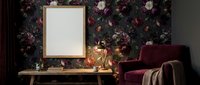 Moody dark floral living room interior with blank wooden frame mockup, vintage desk, glowing lamp, and velvet armchair for art display.