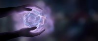Hands protecting glowing geometric crystal sphere with magical purple light energy for spiritual healing and meditation practices.