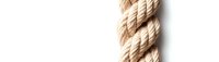 Twisted natural hemp rope macro showing detailed fiber texture and braided pattern on white background, isolated for design projects and maritime concepts.
