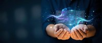Businessman hands holding futuristic digital holographic data visualization with glowing charts and analytics in dark technology background.