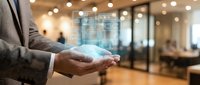 Businessperson holding glowing digital globe in modern office environment, representing global connectivity, technology innovation, and international business expansion opportunities.