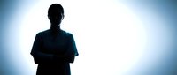 Silhouette of confident businessman with crossed arms against bright white background for corporate presentations and professional marketing materials.