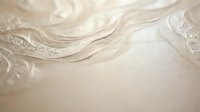 Elegant cream silk fabric with delicate lace trim and flowing texture for luxury fashion, wedding dress design, bridal wear, textile background.