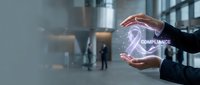 Business professional hands protecting compliance shield symbol with digital network connections in modern corporate office environment for regulatory management.