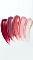 Colorful lipstick swatches in gradient shades from deep red to nude pink on white background for cosmetic and beauty product marketing.