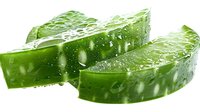 Fresh cucumber slices with water droplets on white background, macro shot perfect for healthy eating, salad recipes, and natural cosmetics advertising.
