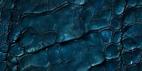 Dark blue leather texture with deep crackled pattern and rough surface, dramatic lighting creates shadows in crevices, macro photography shows detailed grain structure.