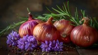 Fresh red onions with purple cornflowers and rosemary sprigs on rustic wooden surface against dark background, moody food photography composition.