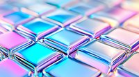 Metallic geometric squares with holographic iridescent effect in pink and blue colors creating modern abstract background pattern with glossy surface texture.