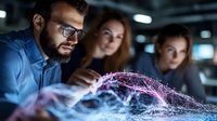 Professional team analyzing holographic data visualization in modern office environment for business intelligence and technology presentations.