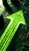 Green digital arrow made of binary code on computer circuit board representing data flow, technology advancement and digital transformation concepts.