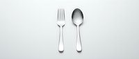 Modern stainless steel fork and spoon set isolated on white background for kitchen utensils, dining, restaurant branding and culinary design projects.